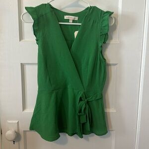 Women’s green shirt.